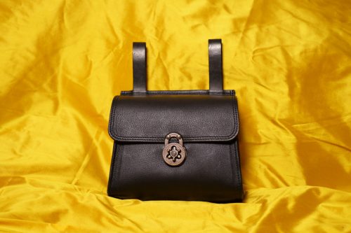 Belt bag with rotating lock